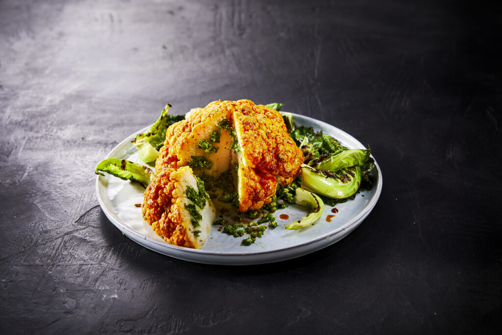Whole Roasted Cauliflower with Broccoli and Walnut Stuffing, and Grilled Brassica Leaves - Vegetaria
