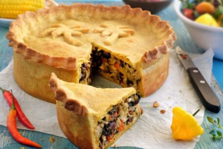 Short crust pastry pie with piece taken out