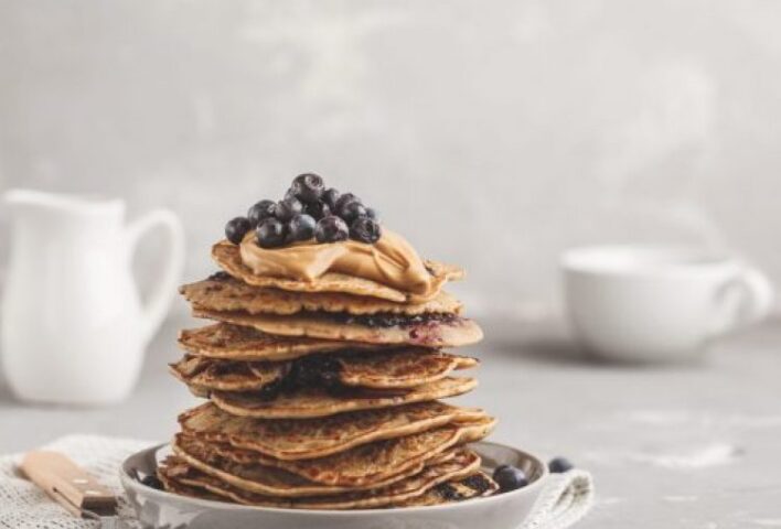 Stack of pancakes with blueberries on the top
