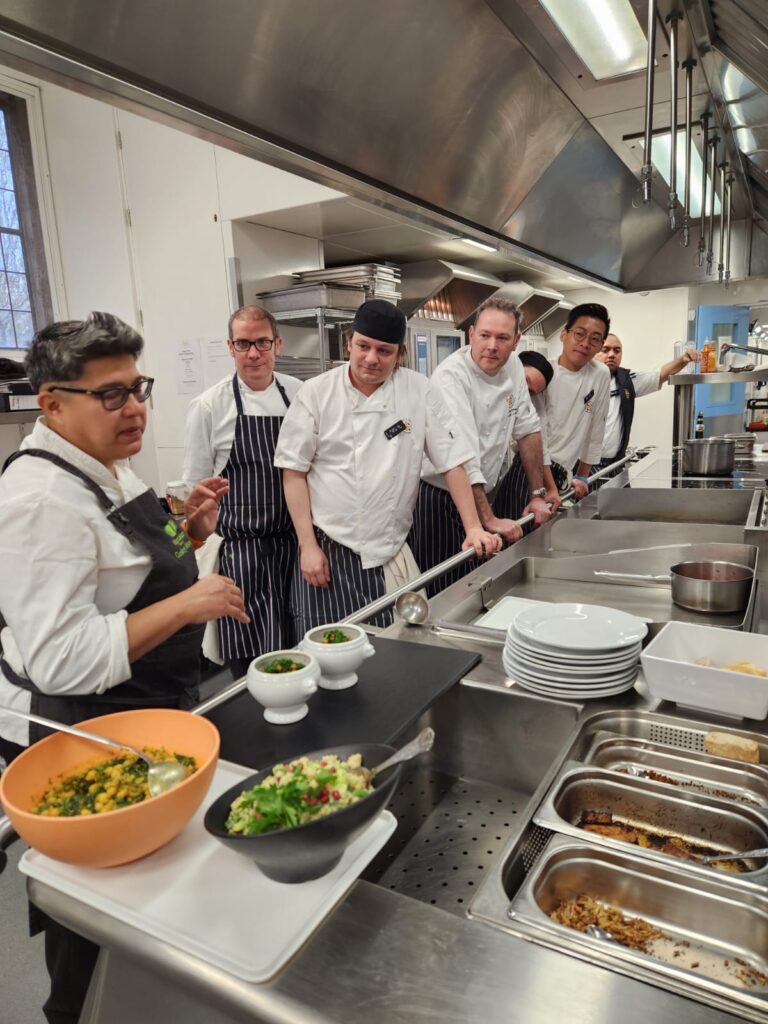 Maz,tutor, with chefs from University College Oxford