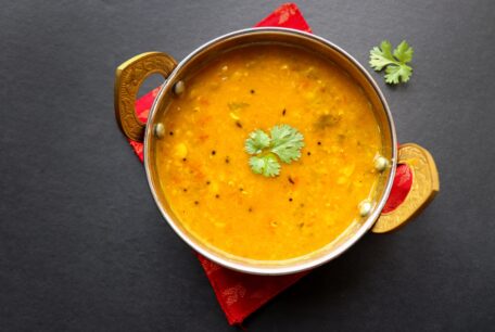 Bowl of vegetarian curry with rice featured in a vegetarian curry class Manchester