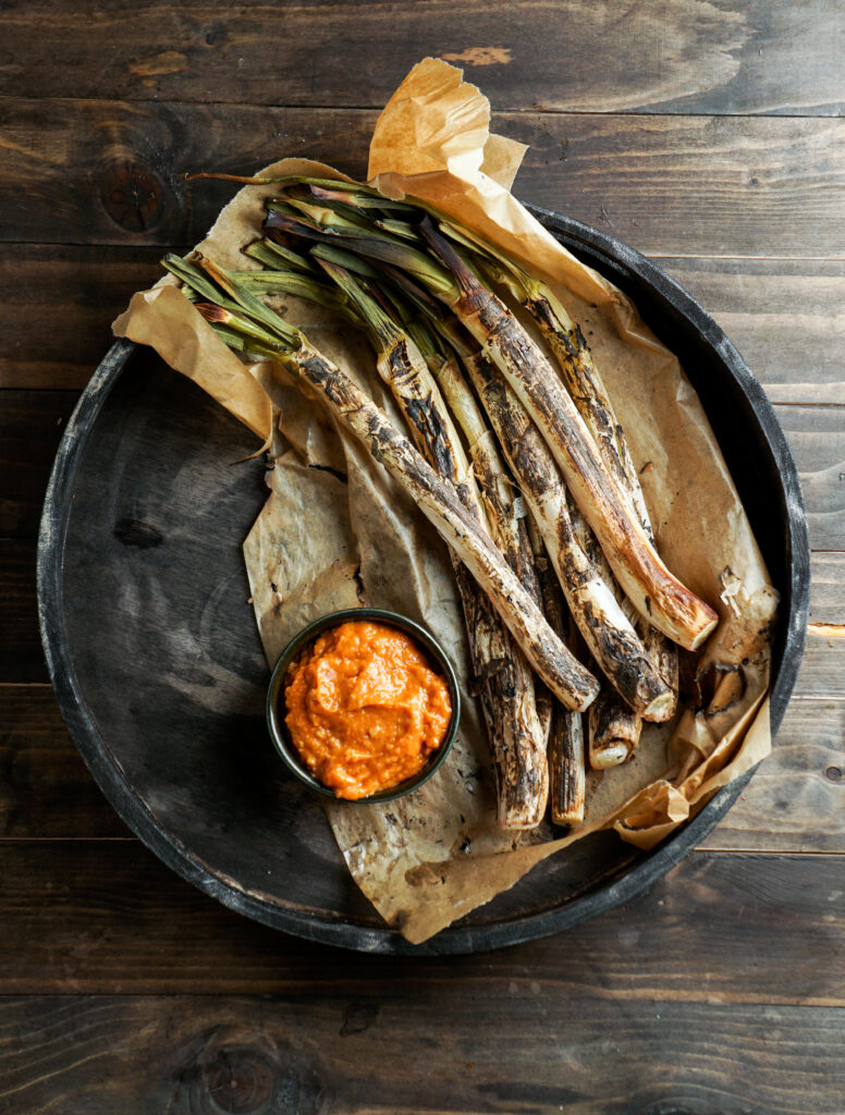 Charred Spring Onions with Romesco Sauce