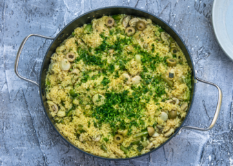 Paella Verde with Griddled Artichokes, Broad Beans, Peas, and Rocket