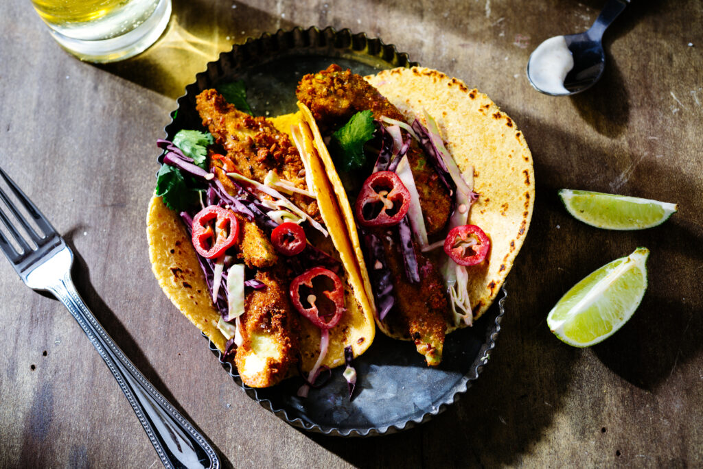 Baja-style courgette tacos plated and ready to enjoy at COOK! with the Vegetarian Society