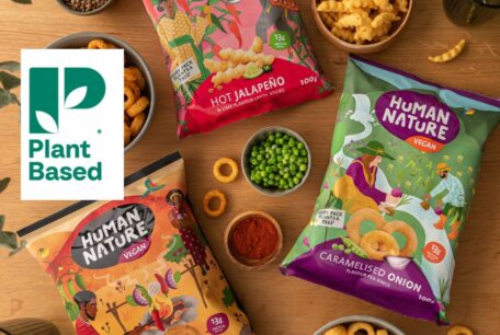 Over head shot of Human Nature snacks with a Plant-Based Trademark