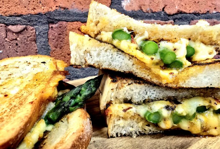 Vegetarian toastie with asparagus, chilli, and oozing cheese filling