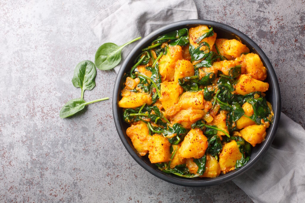 Potato Spinach curry made on the Quick Weeknight Indian class at COOK! with the Vegetarian Society